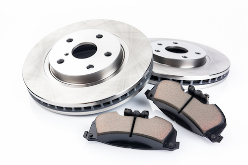 1750155185_car-brakes-beside-brake-pads.jpg